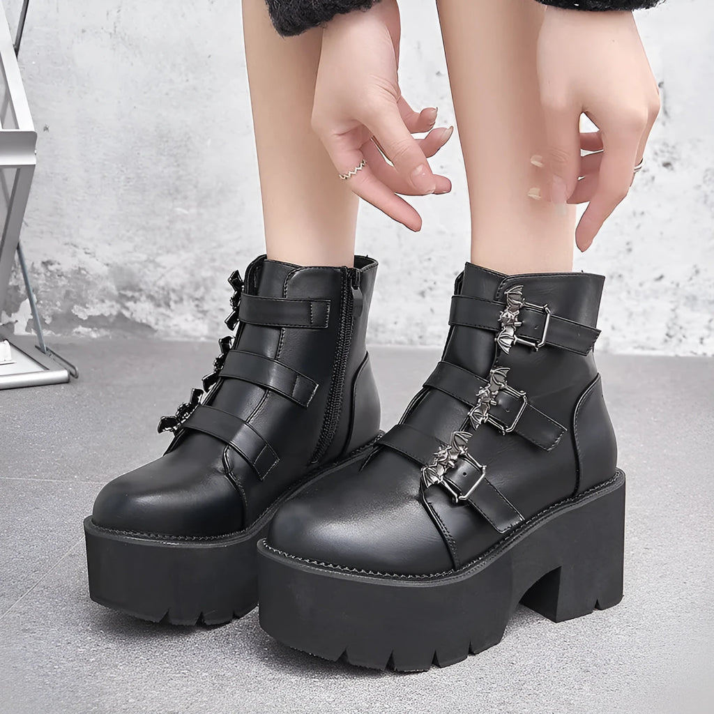 Black women's platform ankle boots with bat buckle Gothic detailing and side zipper