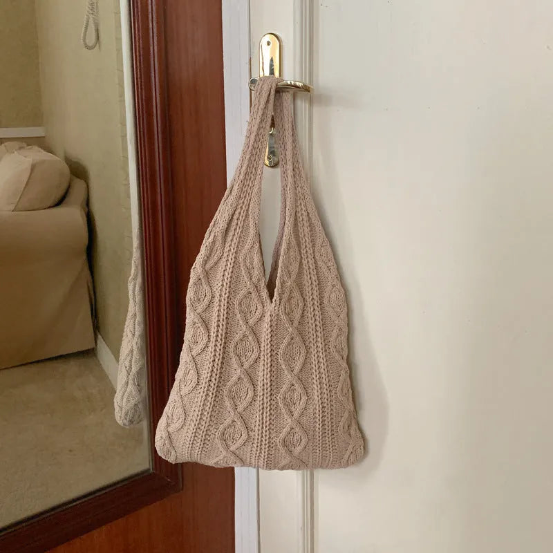 Retro hollow knitted shoulder tote bag in polyester with crochet design showing double straps and large capacity