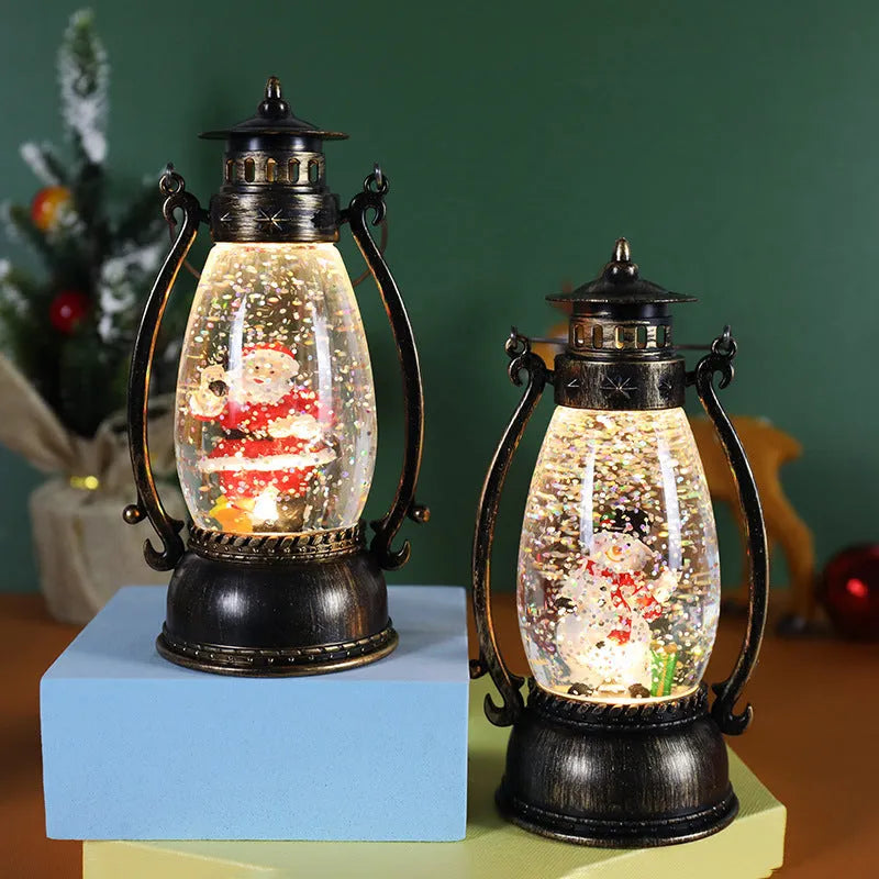 Crystal ball LED Christmas ornament showing snowman and elderly oil lamp design variations