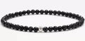 Fine geometric agate bracelet with round and square 4mm beads in obsidian, blue san, and black agate colours.