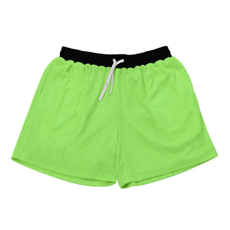 Men's mesh quick-drying sports shorts in solid colours for athletic activities