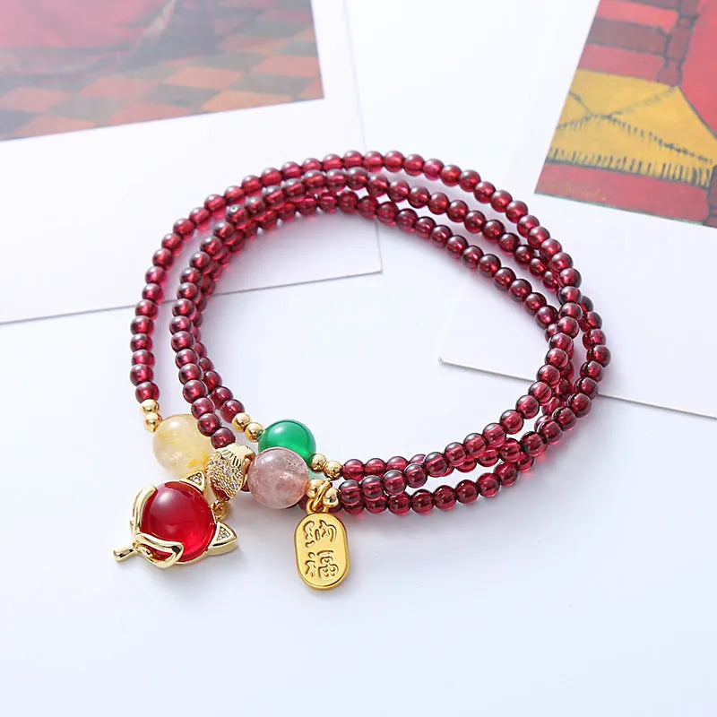 Purplish red garnet fox bracelet with adjustable cord for women