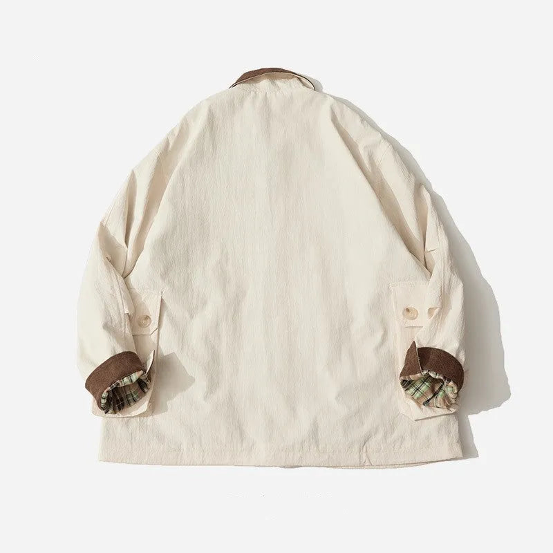Unisex solid colour polyester jacket with side seam pockets in green or apricot