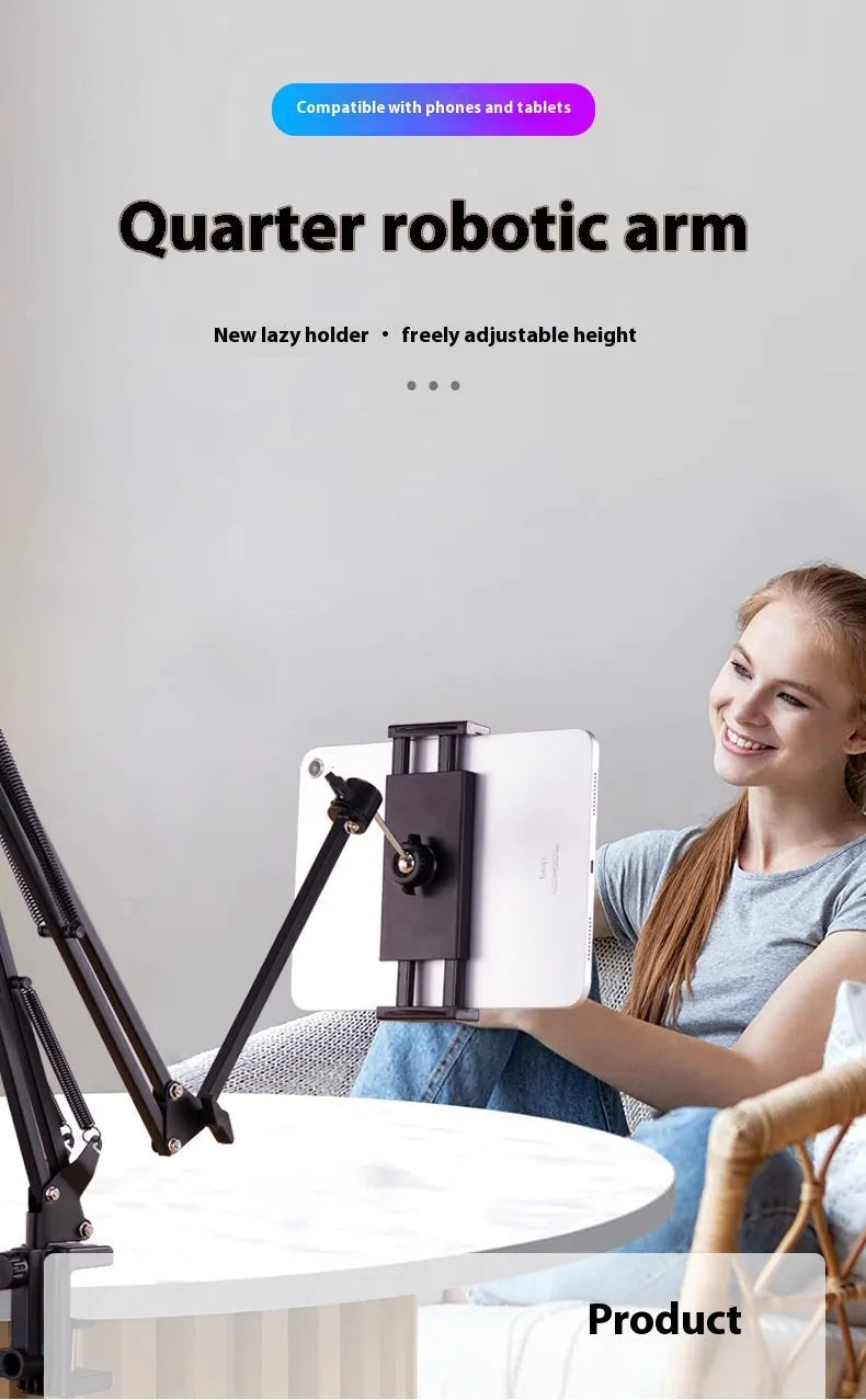 Black foldable metal cantilever bracket holding a tablet on a desktop, showing adjustable arms and clamp.