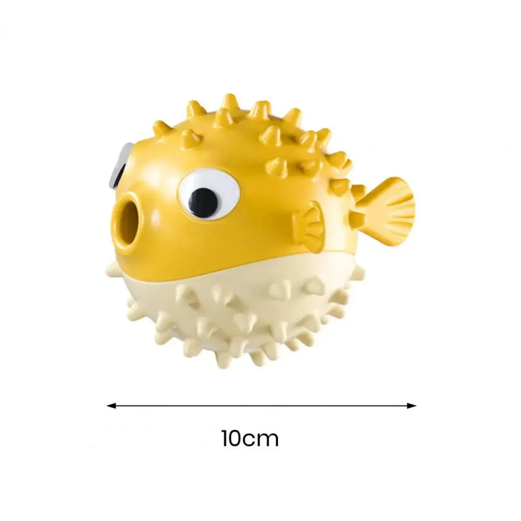 Yellow fish-shaped dog chew toy with convex texture and squeaker for aggressive chewers