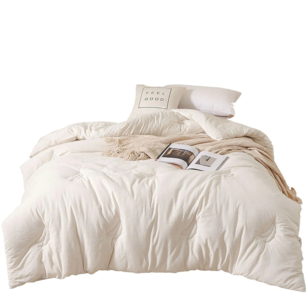 Soybean fibre filled quilt with pure cotton cover in grey, showing twill weave texture on a bed.