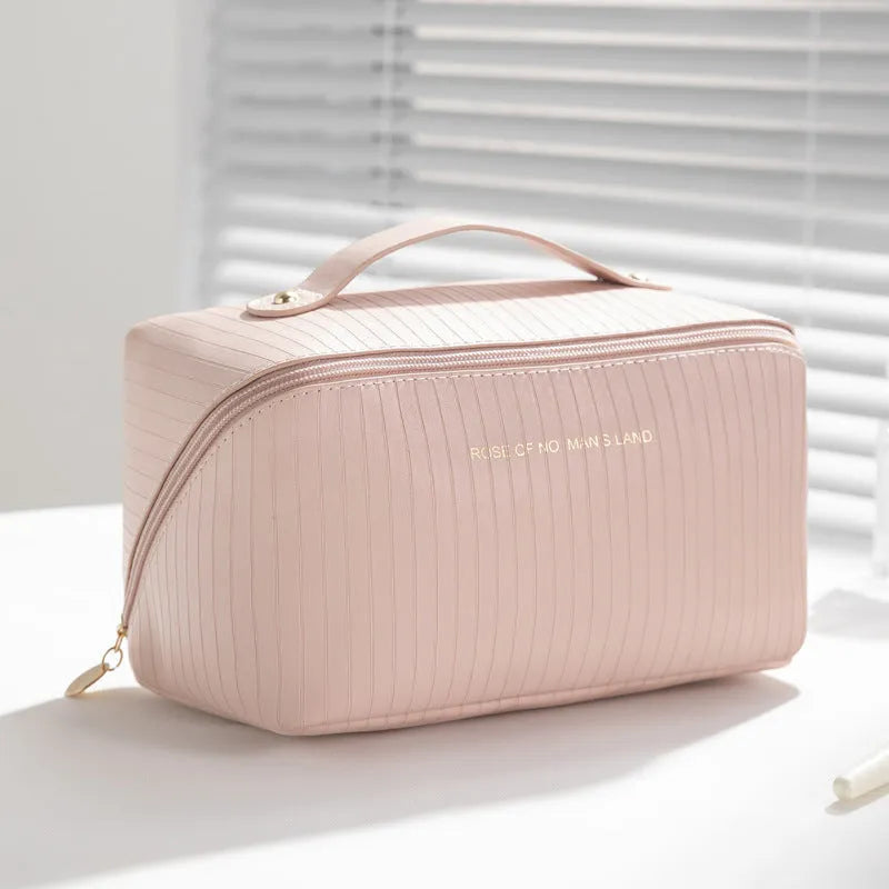 Cubic pillow makeup bag with vertical pattern in five colour options showing 22.5cm dimensions