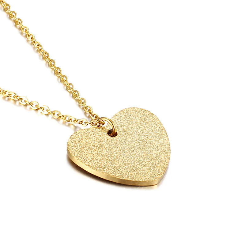 Silver geometric heart pendant necklace on a 45 cm titanium steel chain.