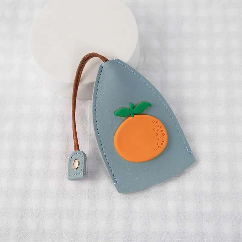 Cartoon pull-out key case in PU leather with colourful design, showing compact 14cm by 7.5cm dimensions