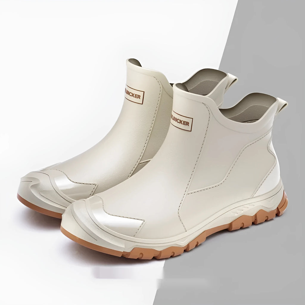 Short tube PVC wading shoe covers with round toe and non-slip plastic sole in solid colour.