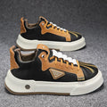 Men's beige low-top sneakers with elastic band and round toe on a white background