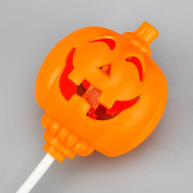 Plastic pumpkin decorative lamp with USB charging cable and yellow or purple light options