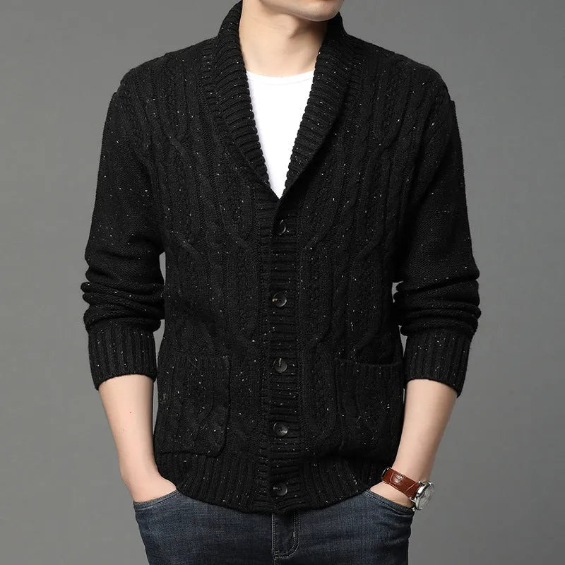 Man wearing a grey Korean style jacquard patterned knitted cardigan jacket.