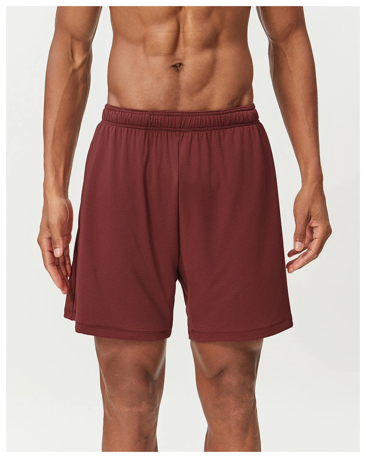 Man's quick-drying athletic shorts in khaki colour, showing double-layer construction and mid-waist fit.