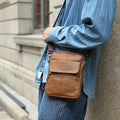 Men's brown genuine leather crossbody shoulder bag with sewing line detailing