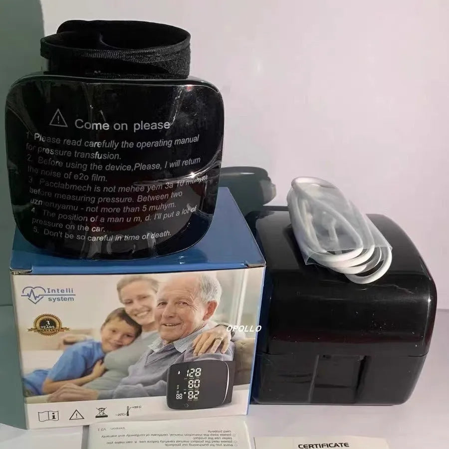 Black wrist sphygmomanometer with digital display and voice prompt buttons for home blood pressure monitoring