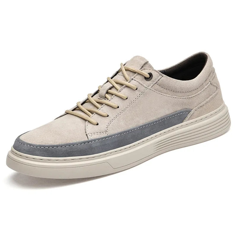Men's grey and sand coloured low-top casual skate shoes with round toe and lace-up front.