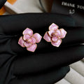 Gold plated purple oil-spot glaze flower stud earrings on copper with fresh floral design
