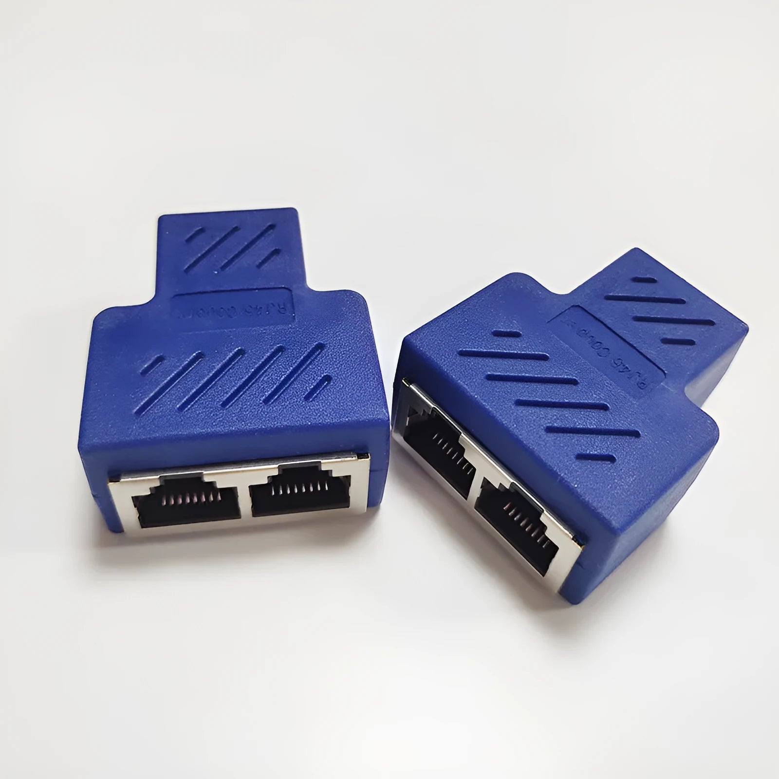 RJ45 network cable splitter adapter in multiple colours, showing one input and two output ports.