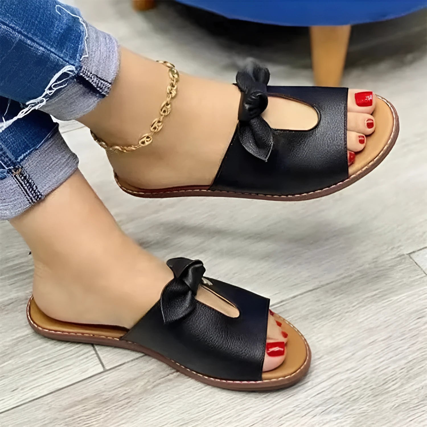 Ladies sandals with fish mouth style and bow detail in black, pink, or gold colours
