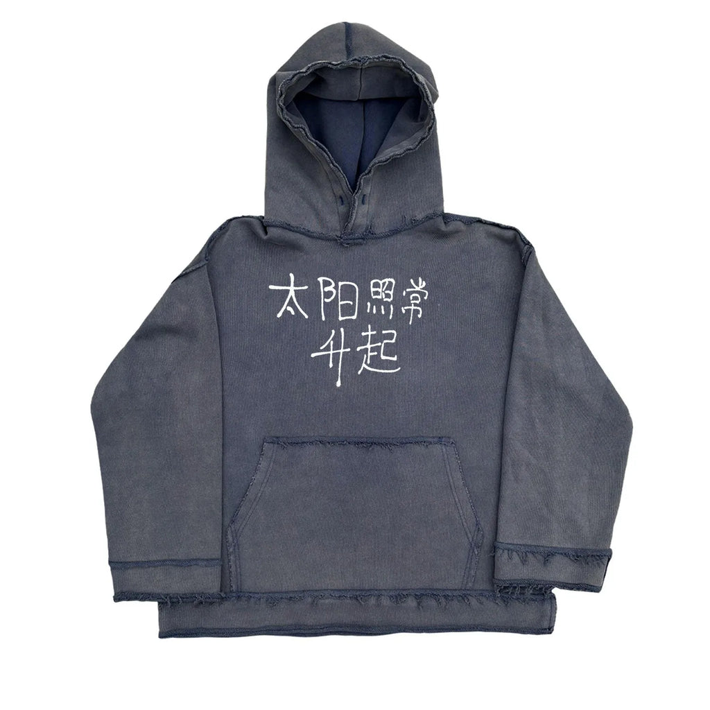 Dark blue hoodie with The Sun Also Rises graphic print on back, showing long sleeves and hood.