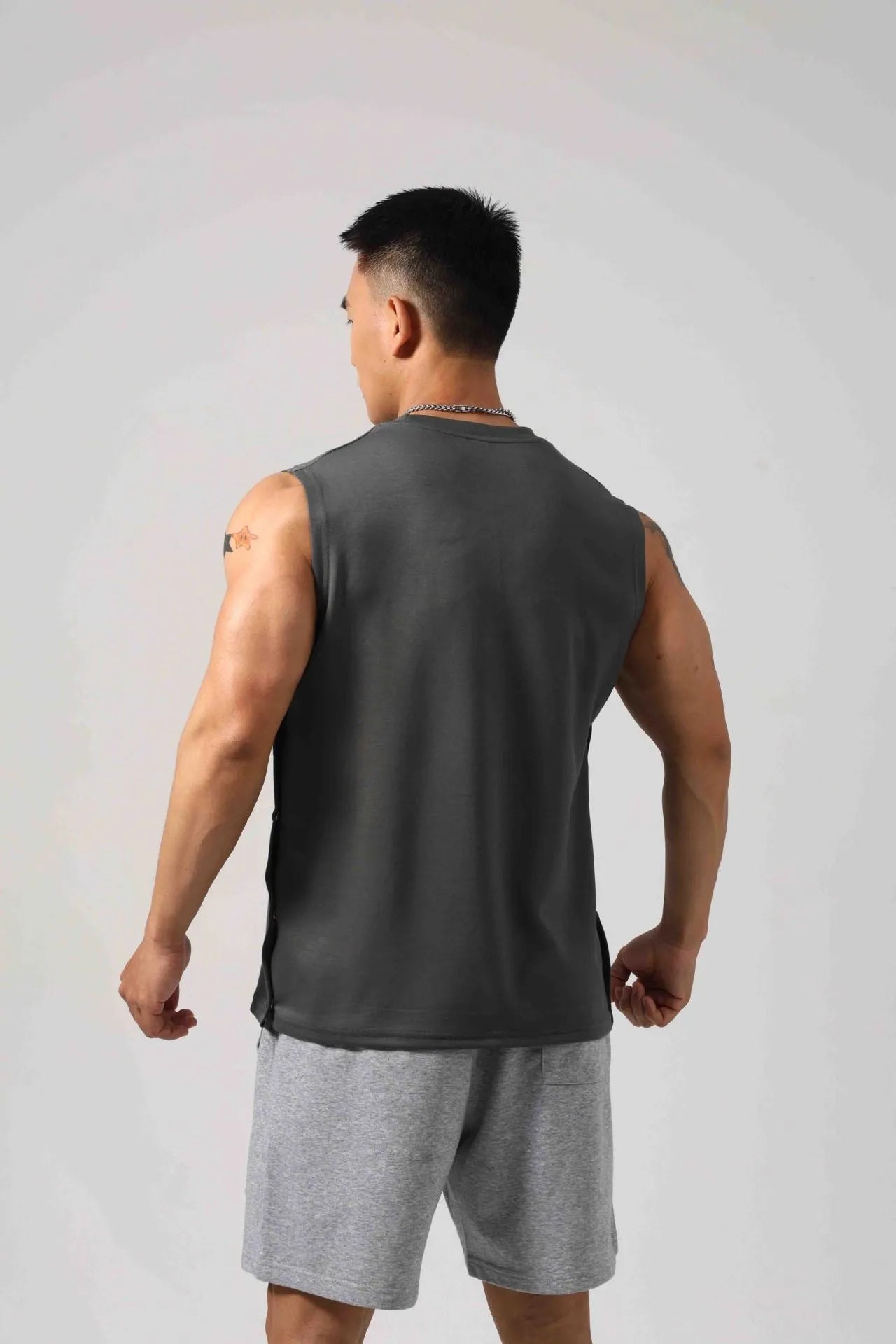 Korean style men's cotton fitness vest with hidden hook side openings in solid colours