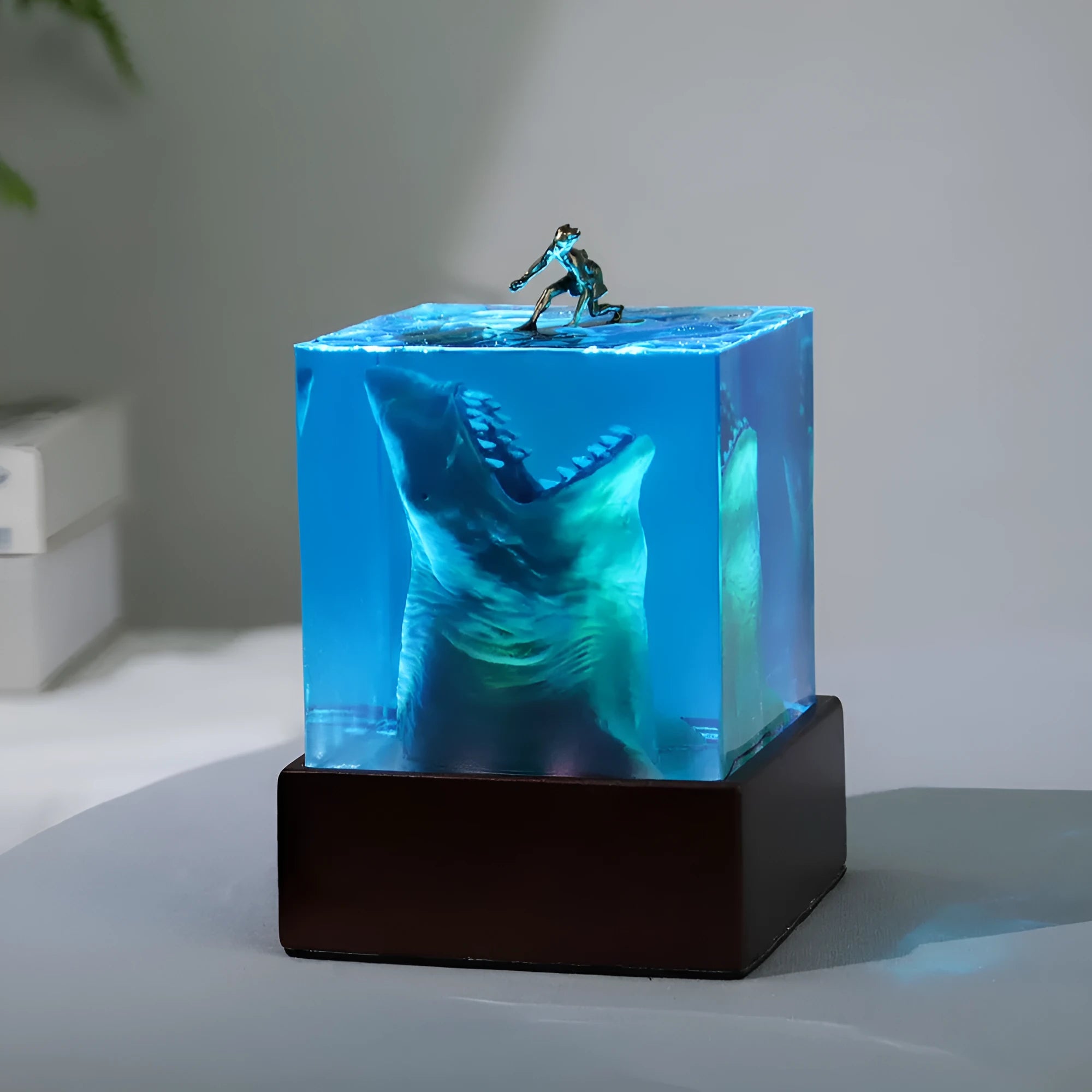 Clear epoxy resin shark surfer night light ornament with LED, modern design in 5cm or 8cm size.