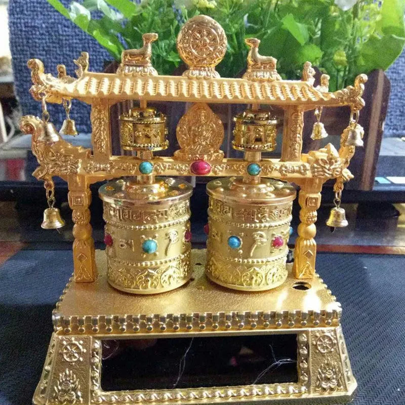 Alloy car prayer wheel decoration with traditional Chinese license plate style.
