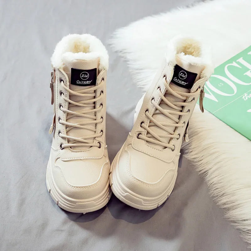 Women's plus size tall black snow boot with velvet lining and lace-up front on a rubber sole.