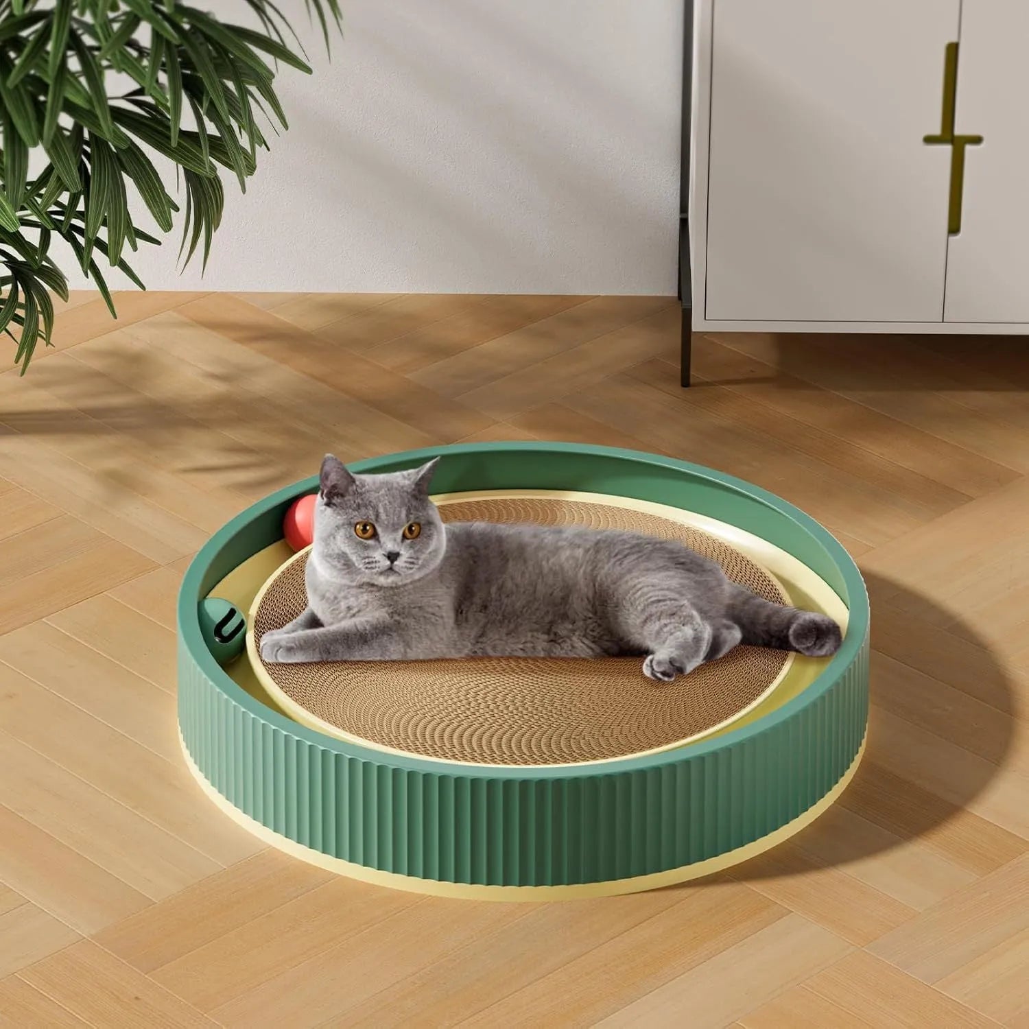 Large circular cat scratching board with ball toys measuring 45cm in diameter