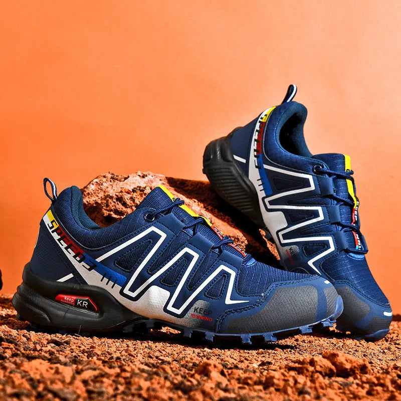 Men's gray orange casual running shoe with synthetic leather upper and low-top design.