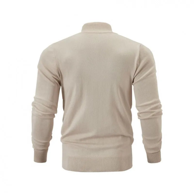 Man wearing a zip-front cotton cardigan in a solid colour, showcasing the stand collar and loose fit.