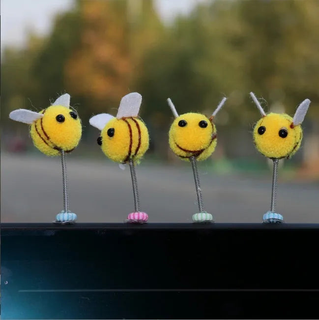Yellow fur ball bee car decoration measuring 3cm square with cartoon design