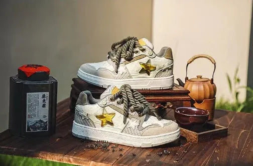 Green low-top casual shoes with star pattern stitching and thick rubber sole