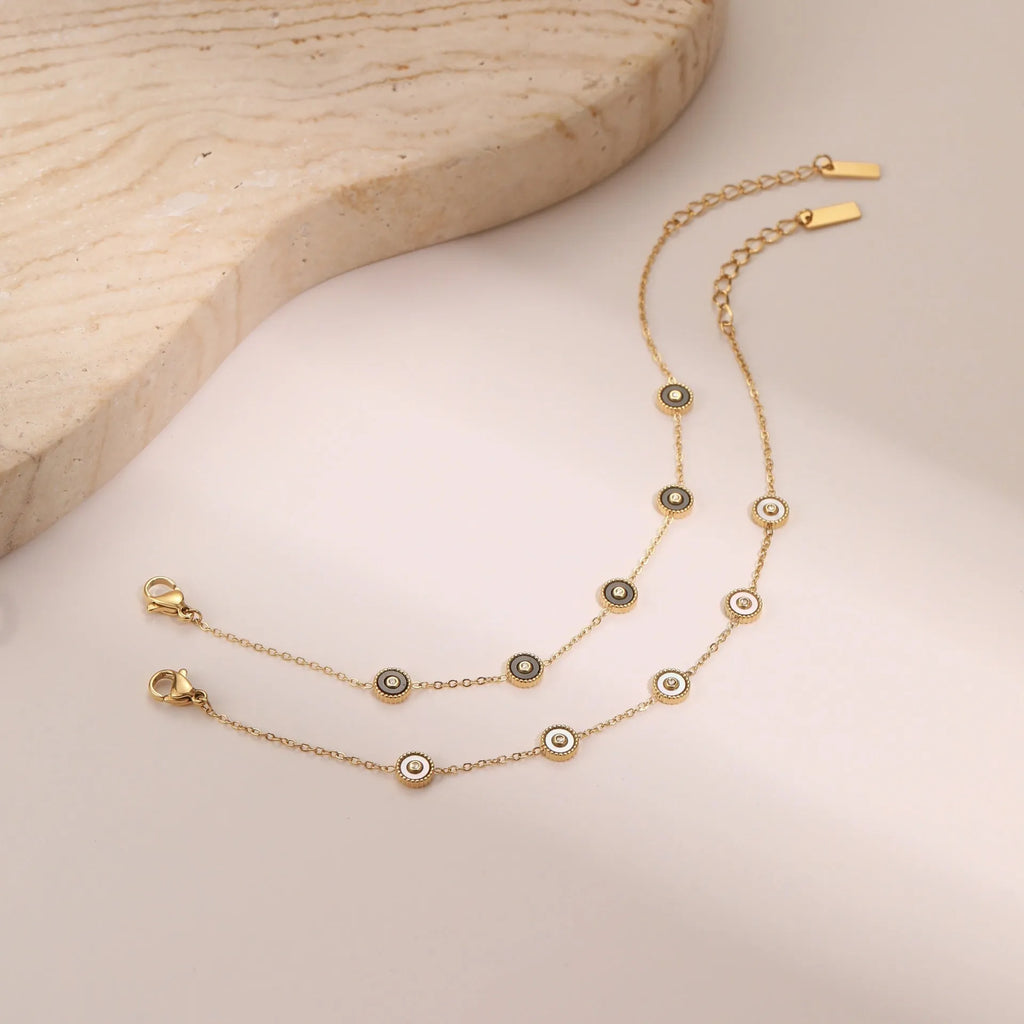 Women's geometric fritillary pattern bracelet and necklace set with 18K gold plating over stainless steel
