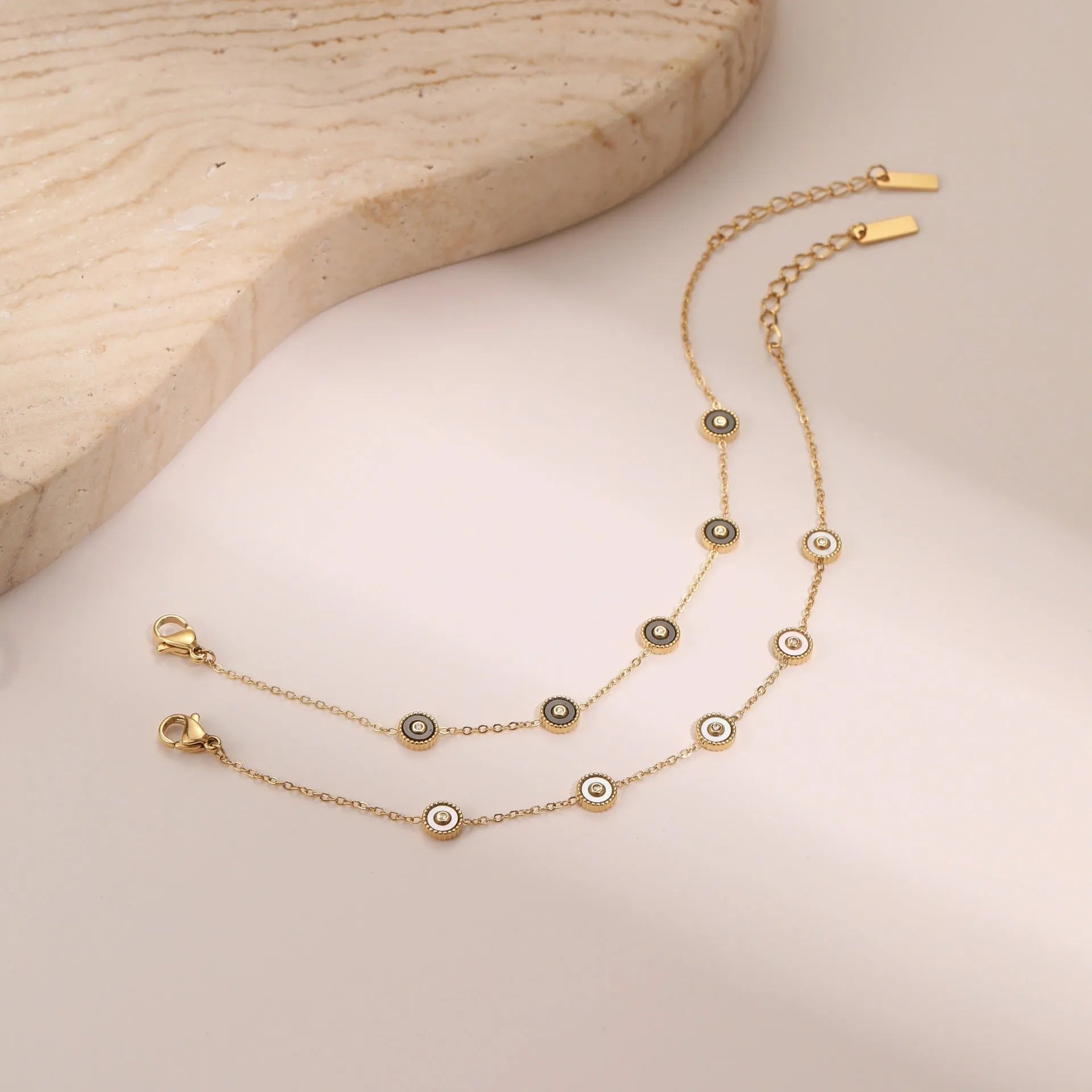 Women's geometric fritillary pattern bracelet and necklace set with 18K gold plating over stainless steel