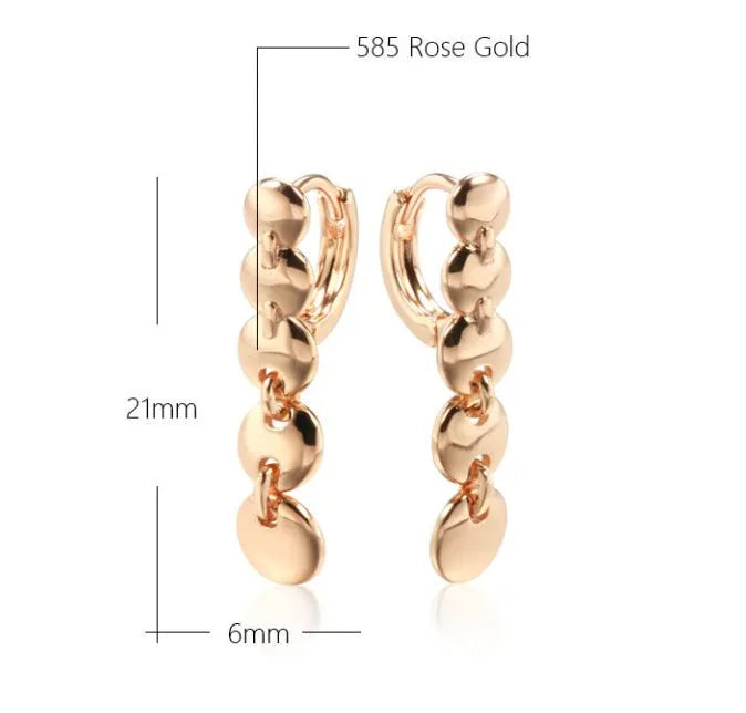Gold-coloured woven copper round circle drop earrings with retro design.