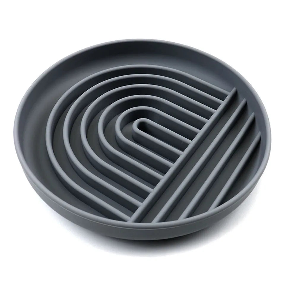 Silicone dog slow feeder bowl with textured ridges, shown in mustard green colour.