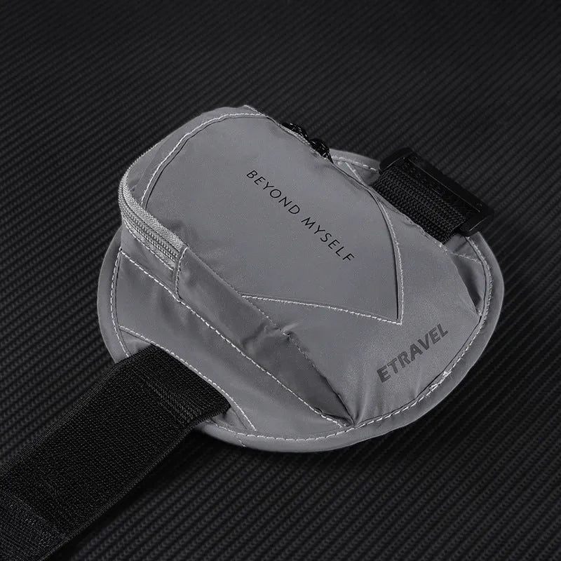 Reflective sports arm bag with strap, shown in fluorescent yellow, black, and silver grey colours.