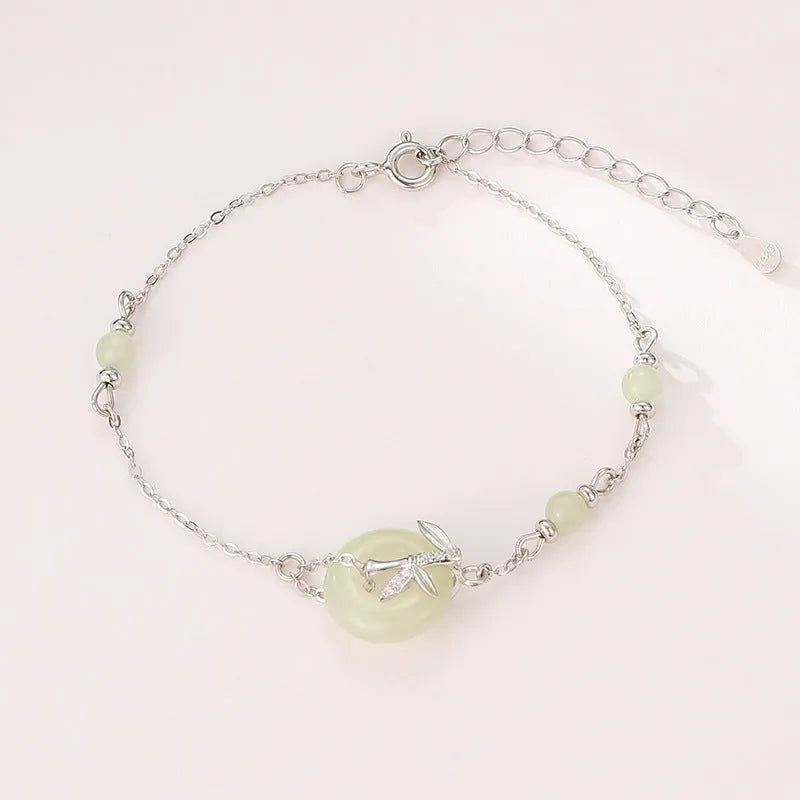 Women's Hetian Jade safety buckle bracelet in antique style with peace buckle design on 925 silver