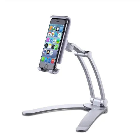 Silver aluminium alloy desktop tablet stand holding a tablet, showing 360-degree rotation adjustment.