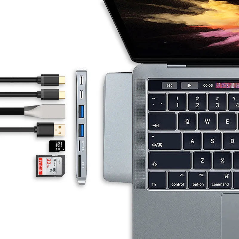 USB-C hub adapter for MacBook Pro with eight ports including HDMI, USB 3.0, SD/TF card reader, and PD charging