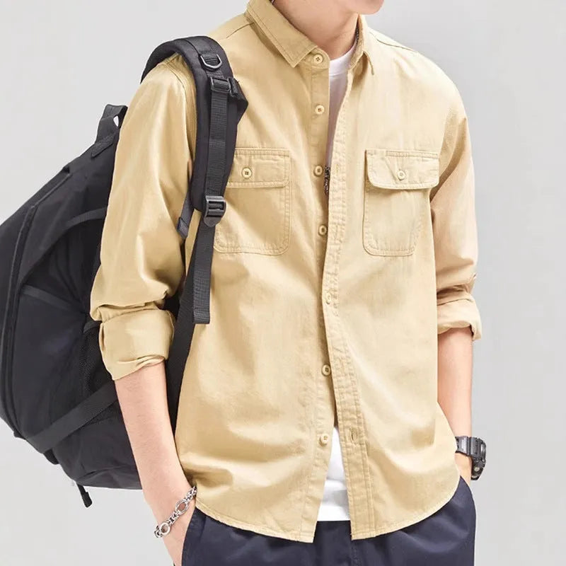 Men's loose long sleeve polyester shirt in cardigan style on a hanger, shown in light grey colour