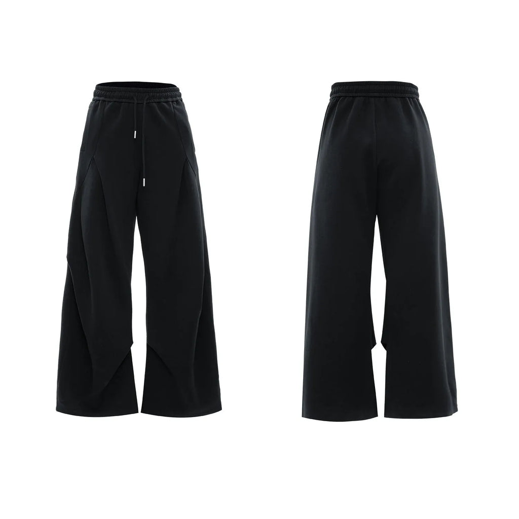 Men's dark grey cotton V-neck sports suit with padded shoulder short sleeve jacket and matching shorts.
