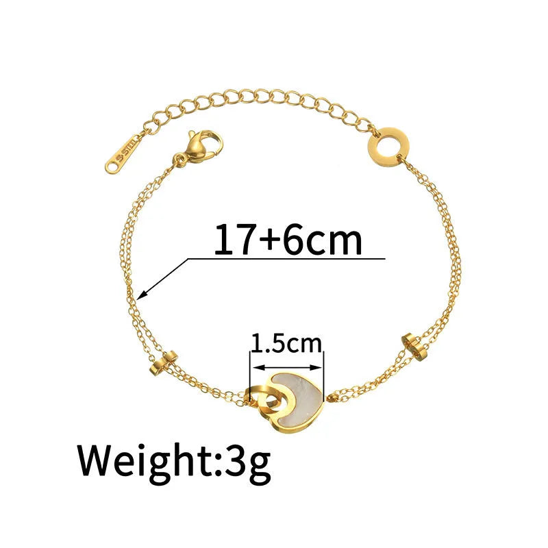 Women's stainless steel bracelet with a double-layered resin heart shape and electroplated finish.