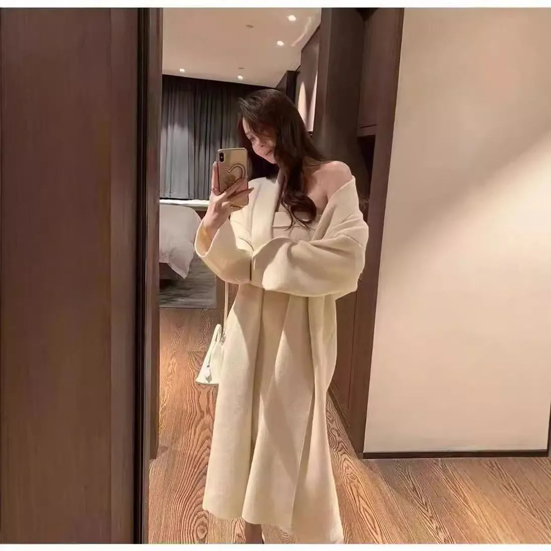 Women's grey knitted cardigan dress suit with matching coat, showing flocked pattern detail.