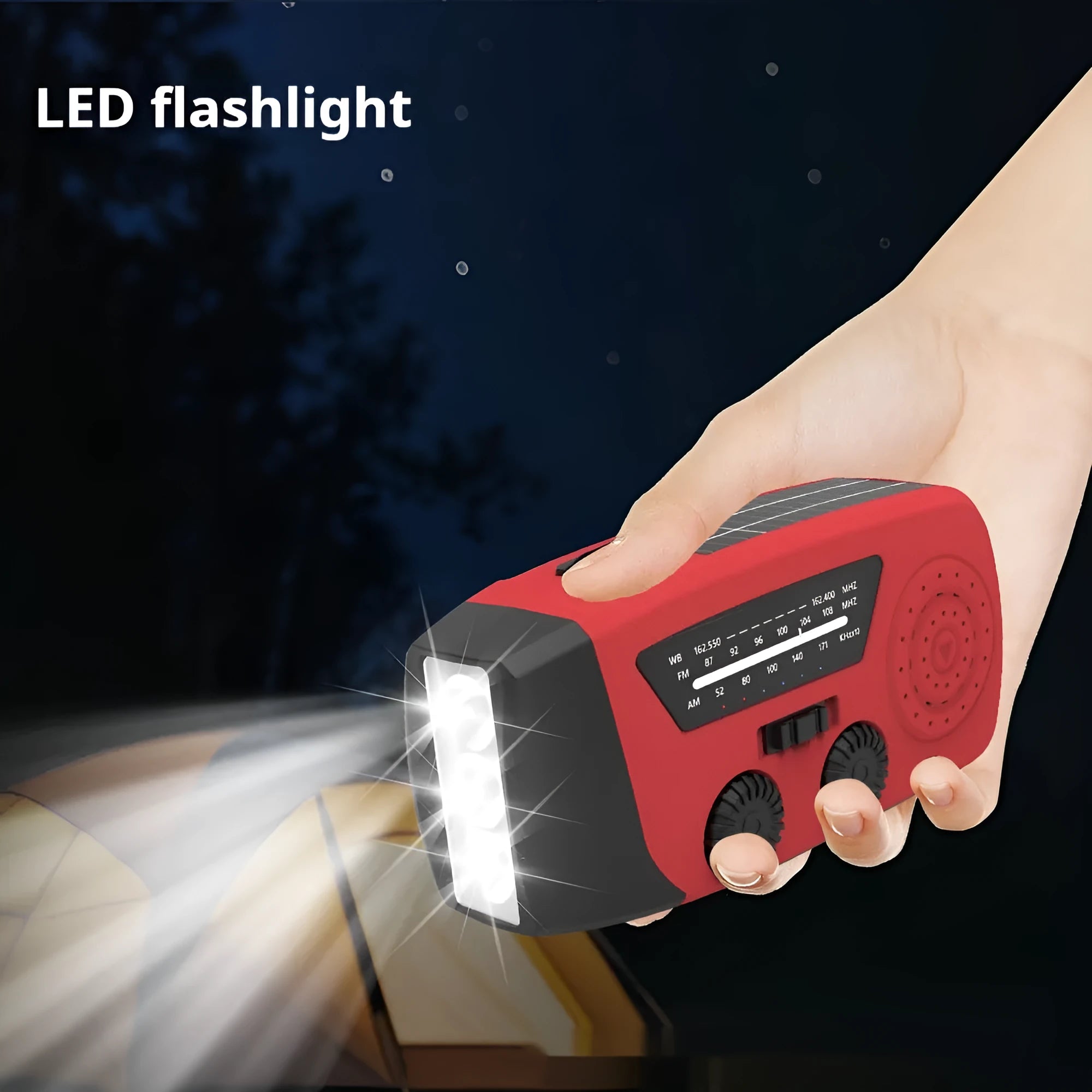 Red rechargeable hand radio torch with USB port and wrist strap on a white background.