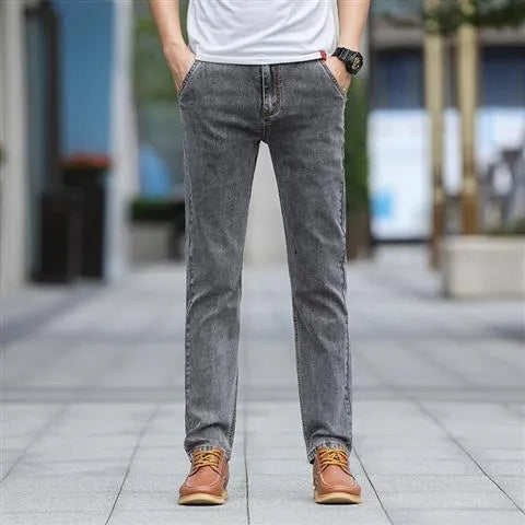 Men's smoky gray straight leg jeans with low waist and zip fly made from elastic rabbit fur fabric