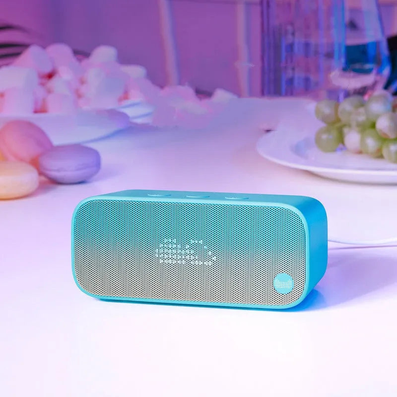 Elf sugar cube artificial intelligence smart WiFi speaker in blue, green, red, or white plastic housing