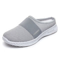 Women's breathable mesh casual shoes with flat heel, round toe, and hollow-out design in black, grey, pink, or purple.
